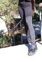 Our  high, waisted signature  all black skinny pants are super chic and are customizable. They exude boldness while providing comfort and flexibility. They have a classic shape, but are composed of polyester, spandex scuba knit and cotton which will keep you warm. The black leather at the bottom gives them a nice edge. Their eclectic nature is an eye catcher! Exclusively Designed by Purple